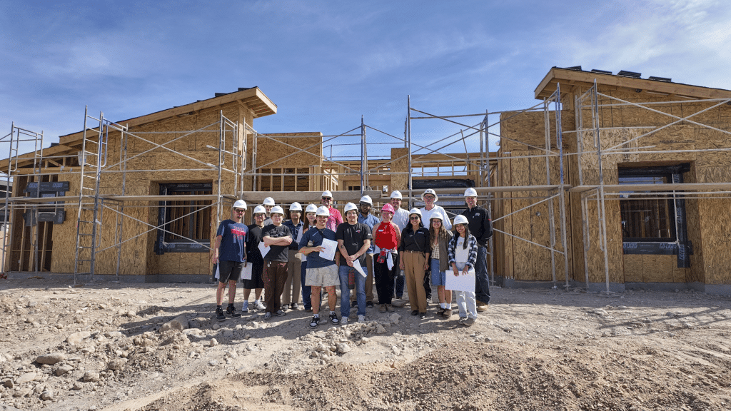Group of UNLV AIAS chapter members and Signature staff members at construction site