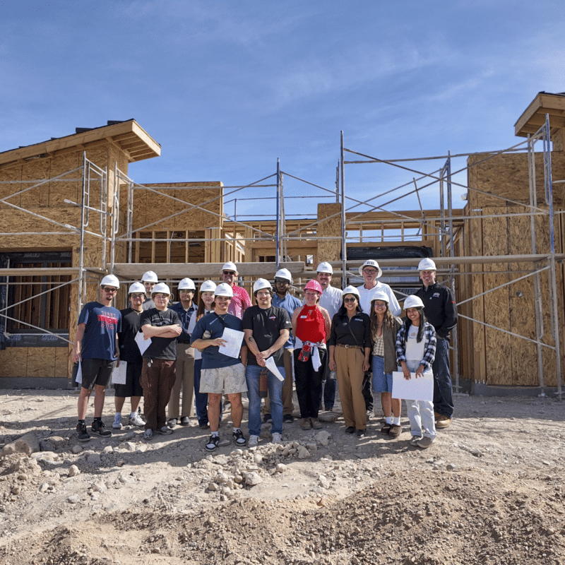 Group of UNLV AIAS chapter members and Signature staff members at construction site